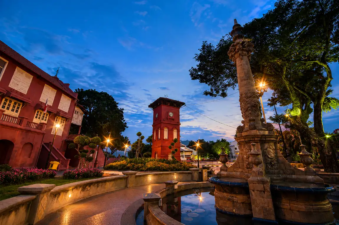 The Stadthuys and Christ Church on Red Square Melaka in warm afternoon light